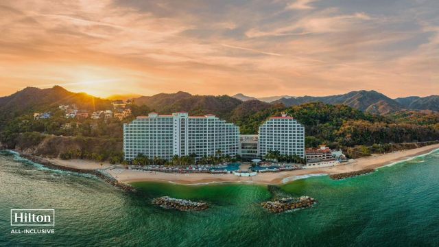 Photo of Book your dream honeymoon at Hilton Villarta Riviera All-Inclusive Resort and indulge in the beauty of Mexico’s Pacific coast. From beachfront relaxation and nightly entertainment to gourmet dining and rejuvenating spa treatments, your stay will create memories to last a lifetime. Simply click “Add Item” to add the registry item to your honeyfund, or click “Save Registry” to add the whole list.